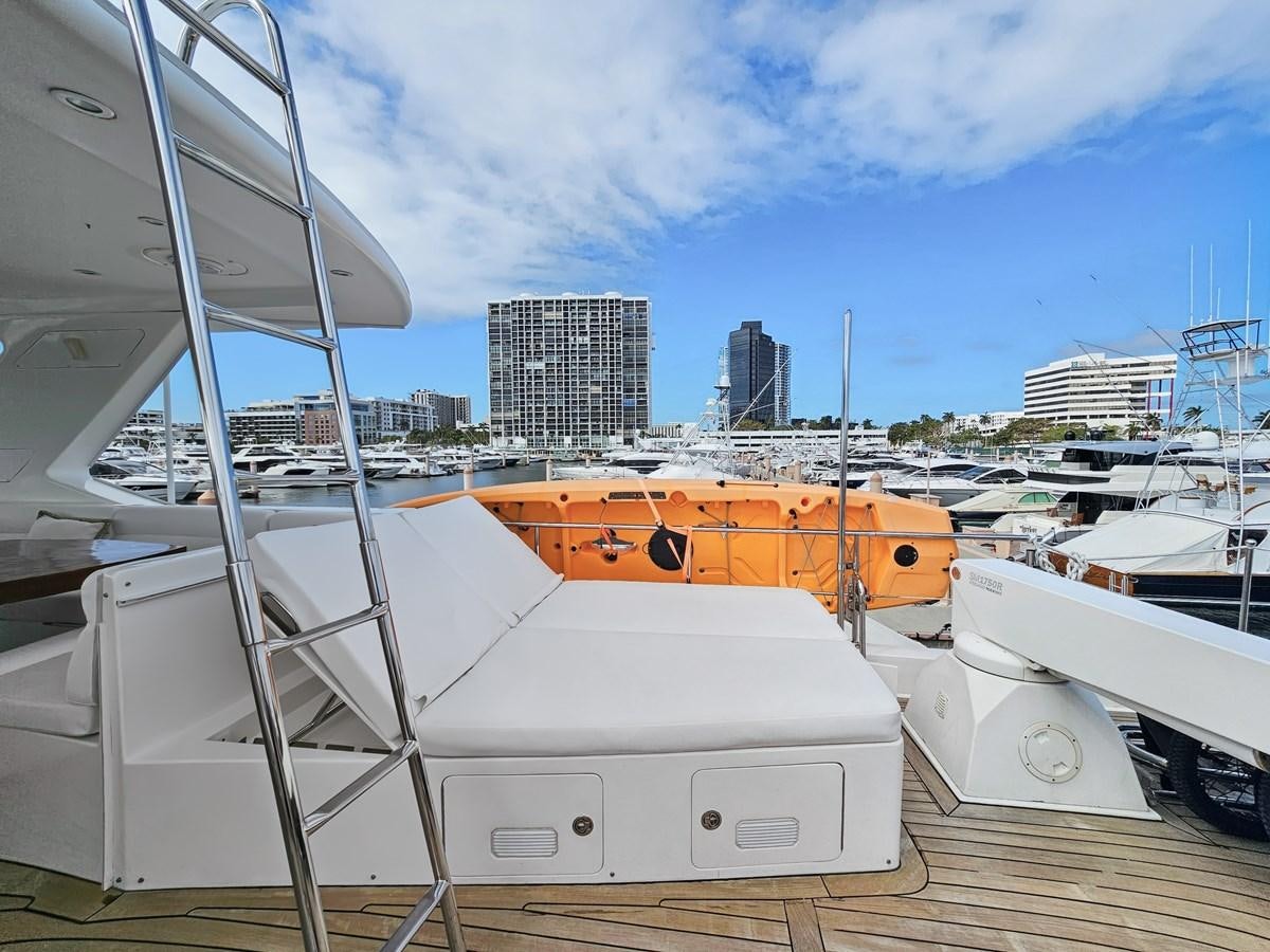 a boat docked at a pier aboard O A Yacht for Sale