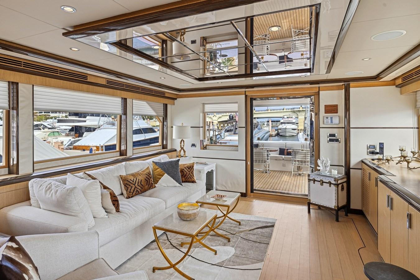 a living room with a large window aboard O A Yacht for Sale