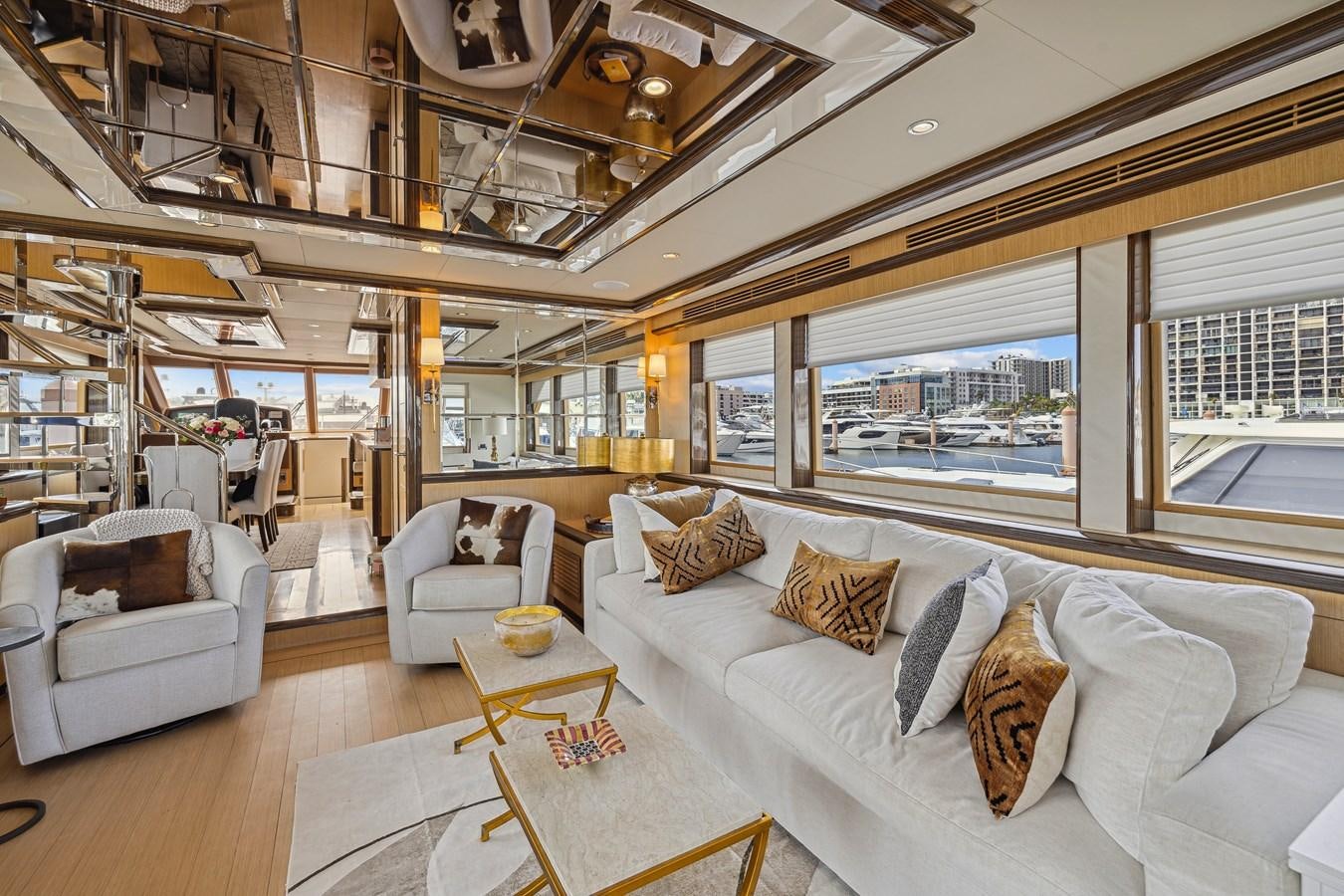 a living room with a large window aboard O A Yacht for Sale