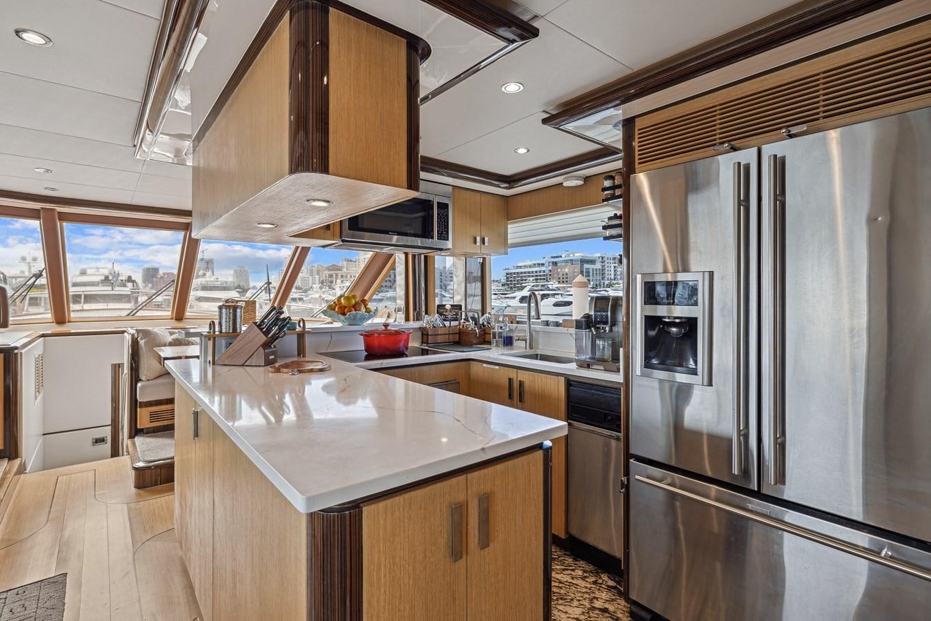 a kitchen with stainless steel appliances aboard O A Yacht for Sale