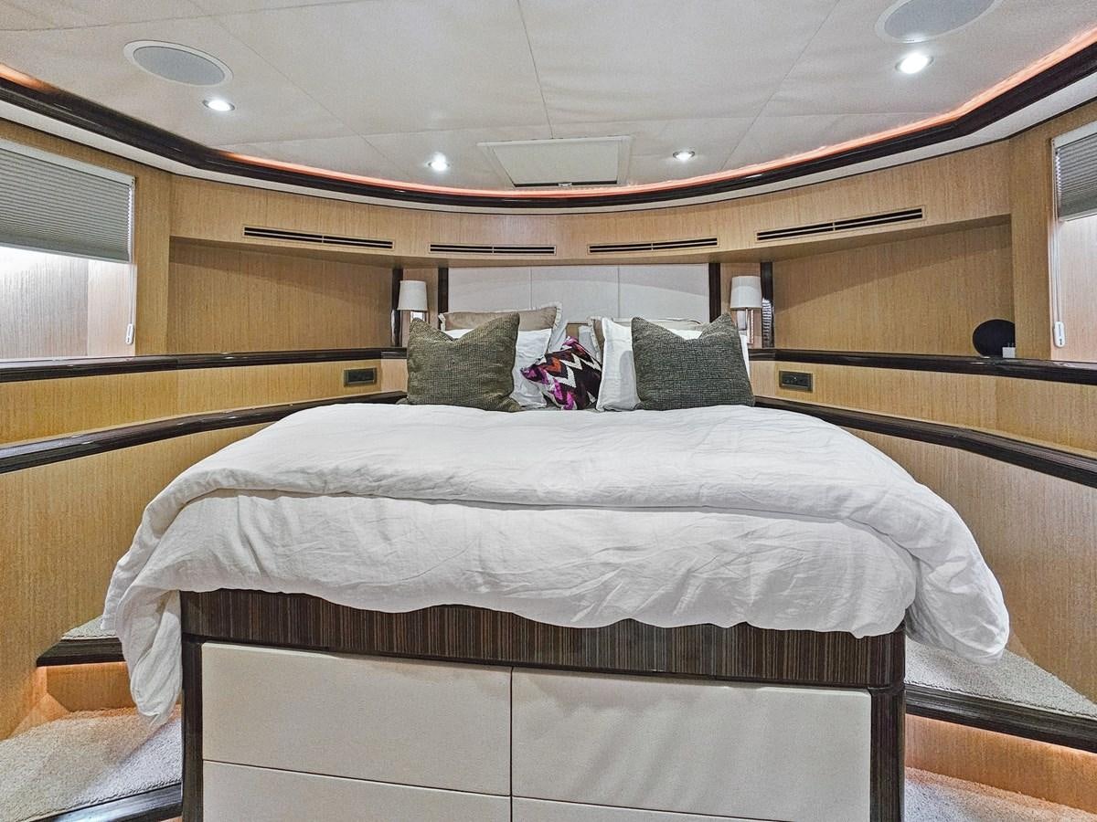 a bed with pillows aboard O A Yacht for Sale