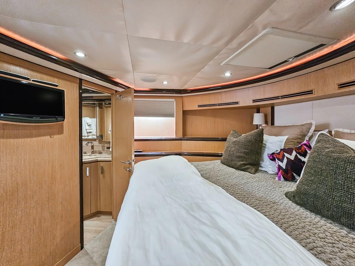 a bed in a room aboard O A Yacht for Sale