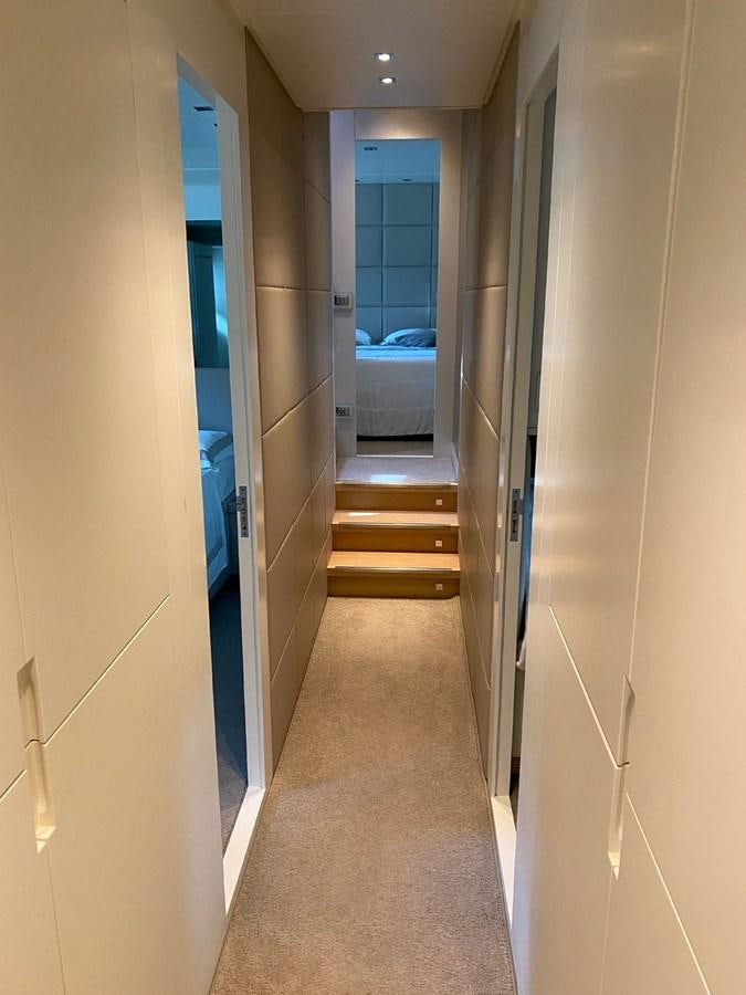 a hallway with a door and a carpet aboard ACCI Yacht for Sale