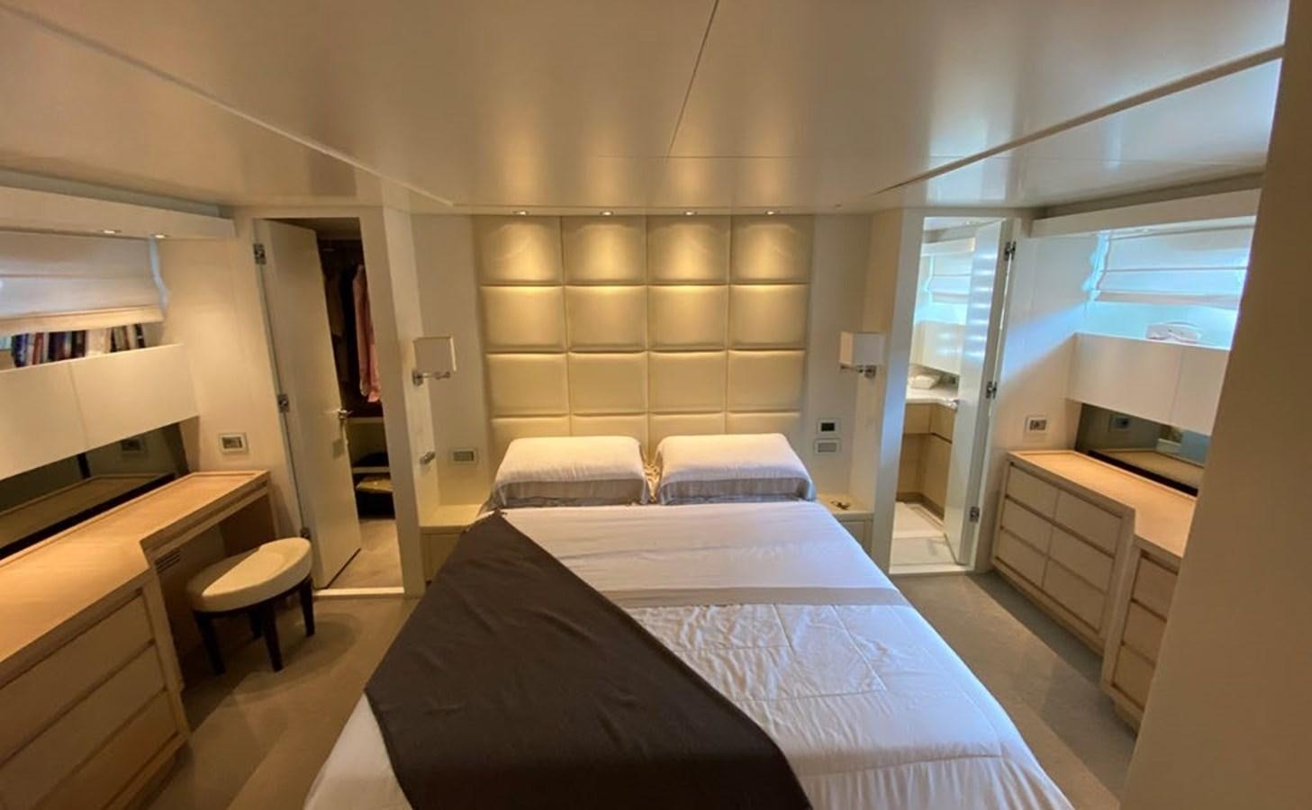 a bedroom with a bed aboard ACCI Yacht for Sale