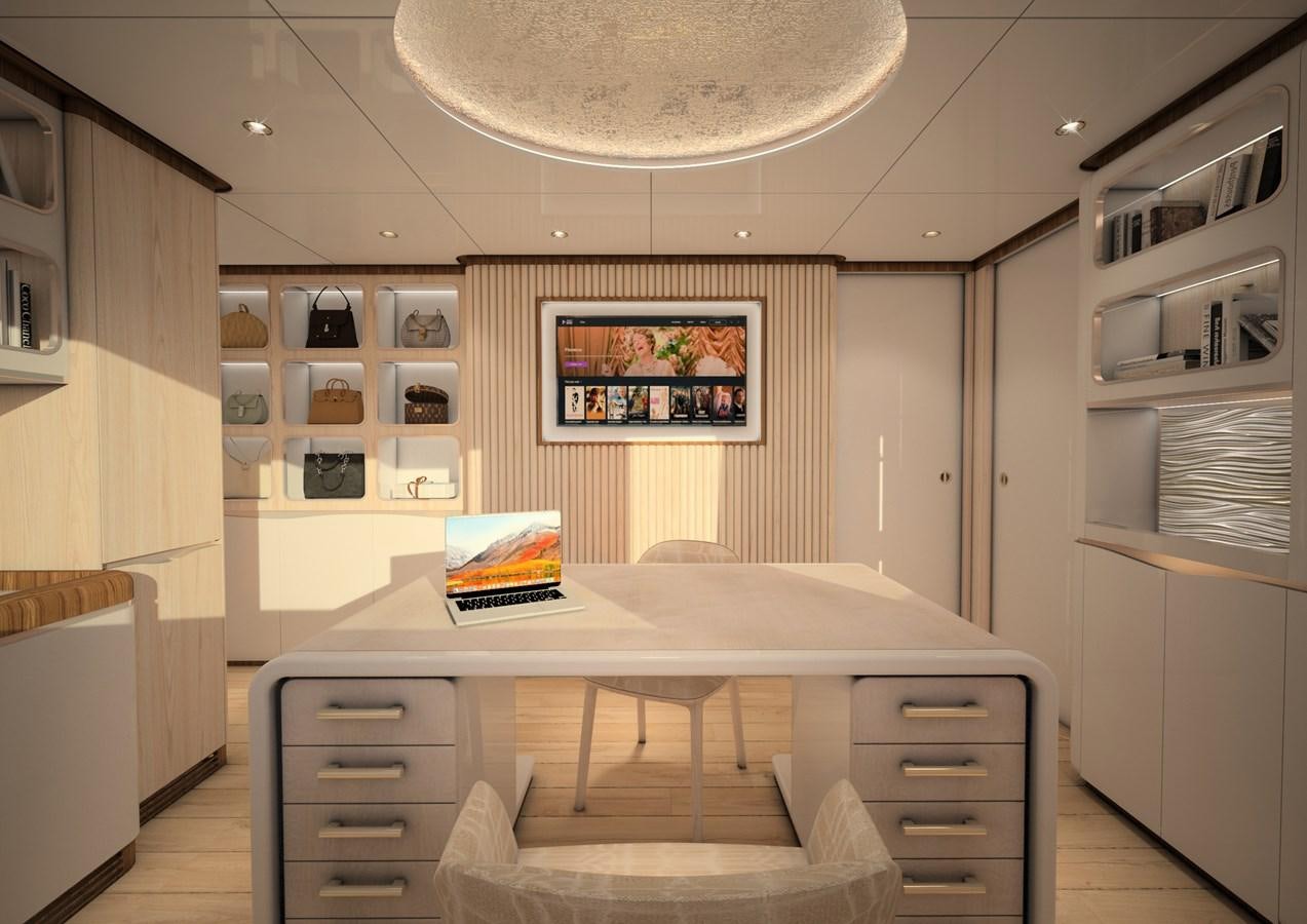 a room with a desk and a book on the table aboard ANJELIF Yacht for Sale