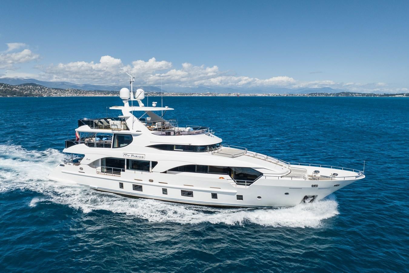 a white yacht on the water aboard MY PARADIS Yacht for Sale