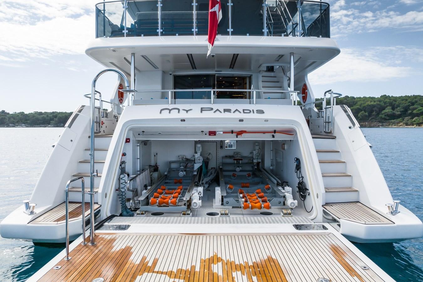 a boat with a ladder on the deck aboard MY PARADIS Yacht for Sale