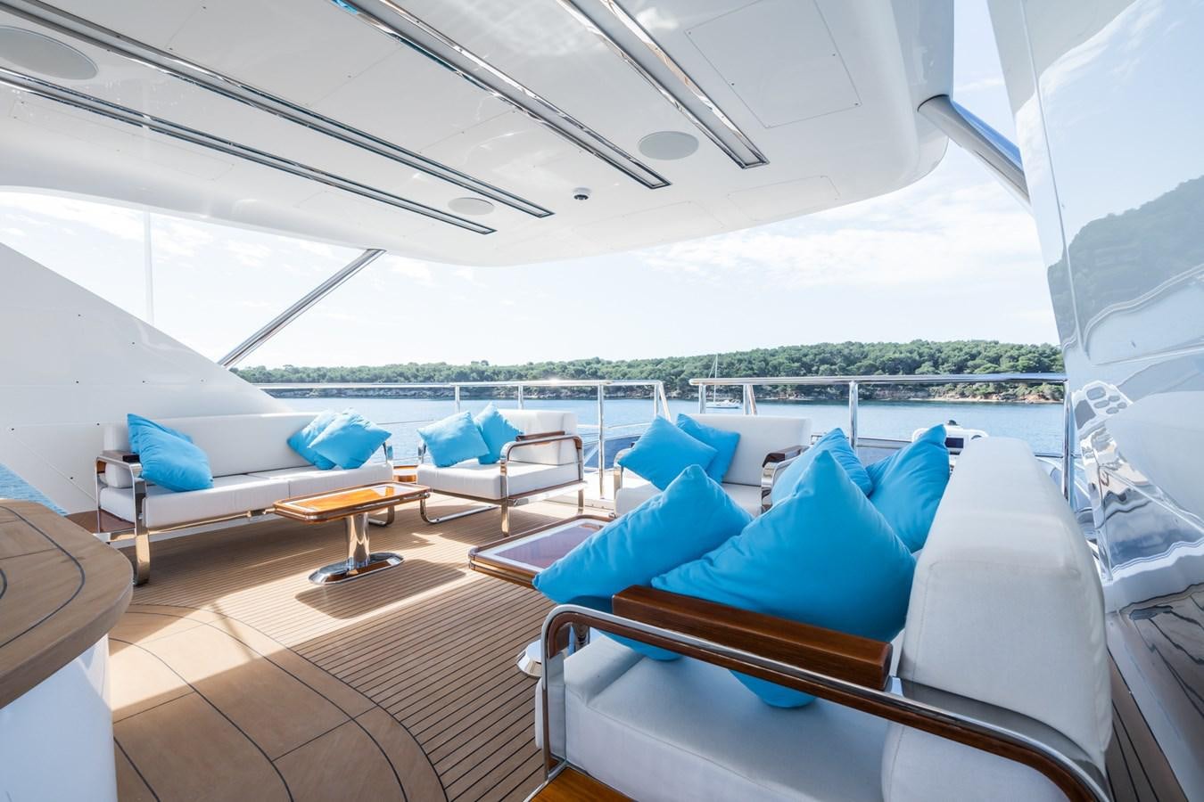 a room with a view of the water and the city aboard MY PARADIS Yacht for Sale