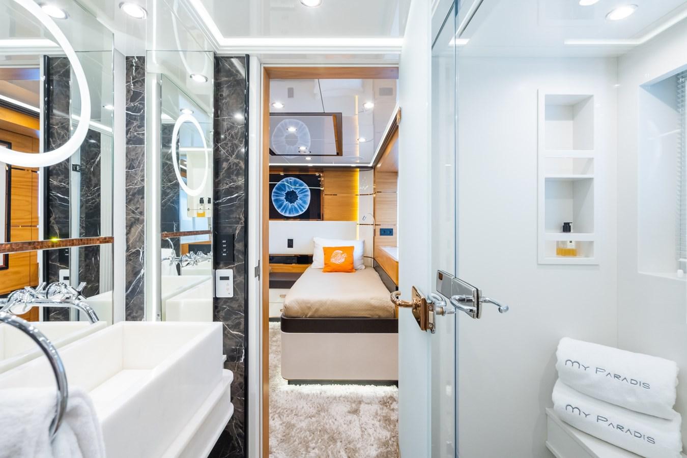 a bathroom with a tub sink and a toilet aboard MY PARADIS Yacht for Sale