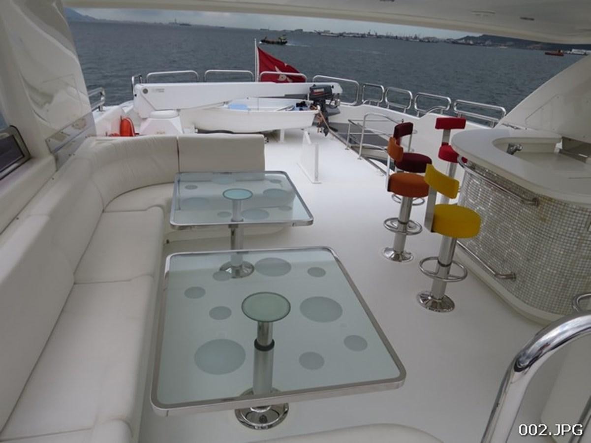 a white machine with a white cover aboard VICTORIOUS Yacht for Sale