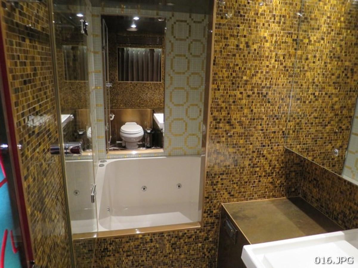 a bathroom with a glass shower aboard VICTORIOUS Yacht for Sale