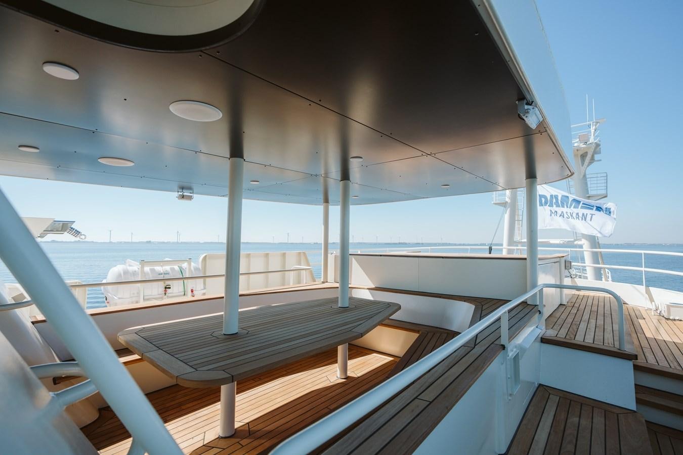 a deck with a view of the water and the deck aboard SCINTILLA MARIS Yacht for Sale
