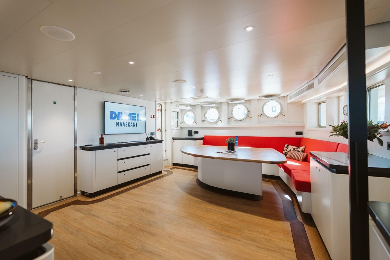 a large kitchen with a large island aboard SCINTILLA MARIS Yacht for Sale