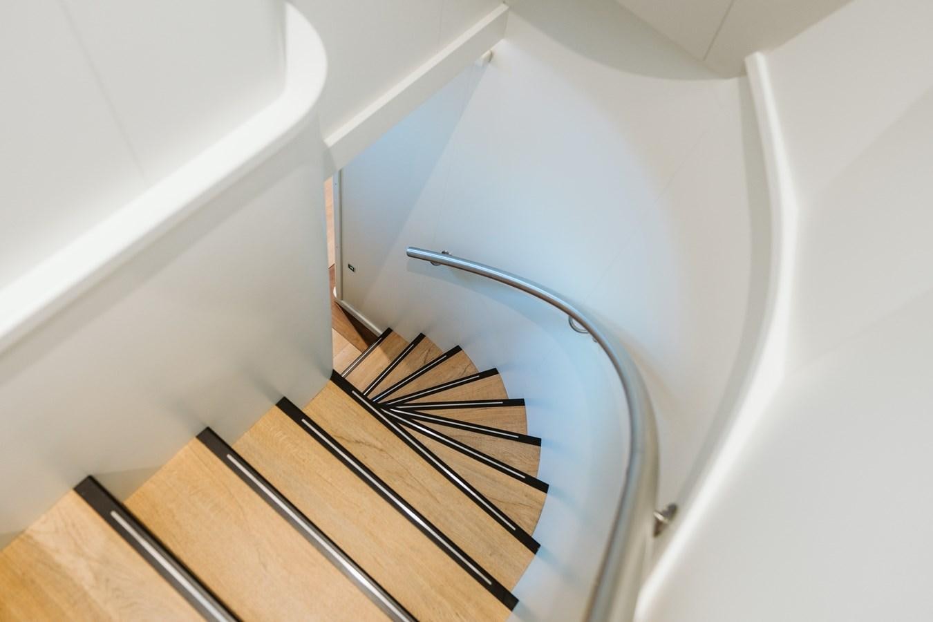 a set of stairs in a room aboard SCINTILLA MARIS Yacht for Sale