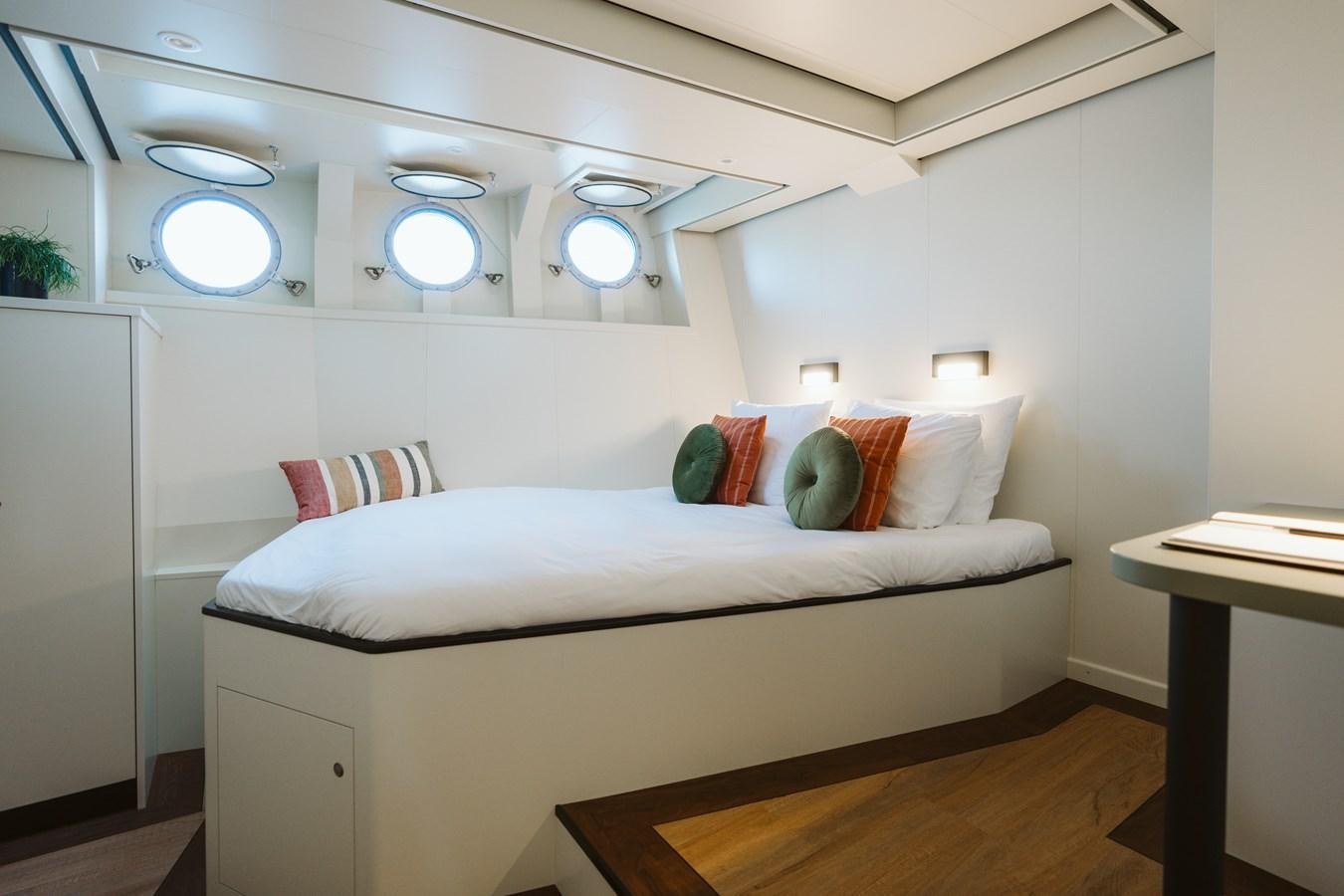 a bed in a room aboard SCINTILLA MARIS Yacht for Sale