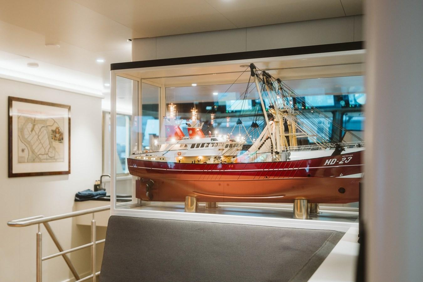 a model of a boat on display aboard SCINTILLA MARIS Yacht for Sale