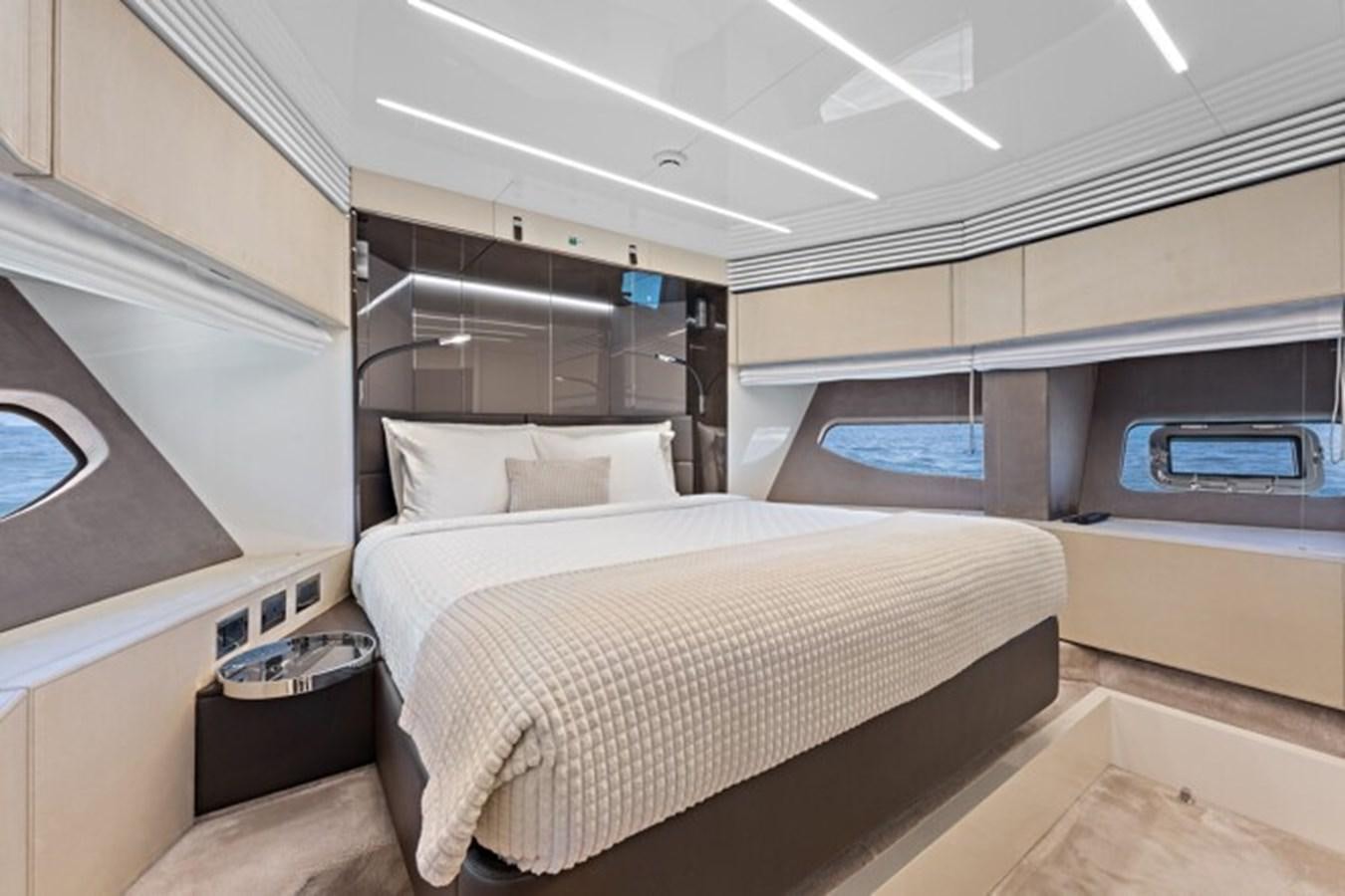 a room with a bed and a window aboard MOSHE Yacht for Sale