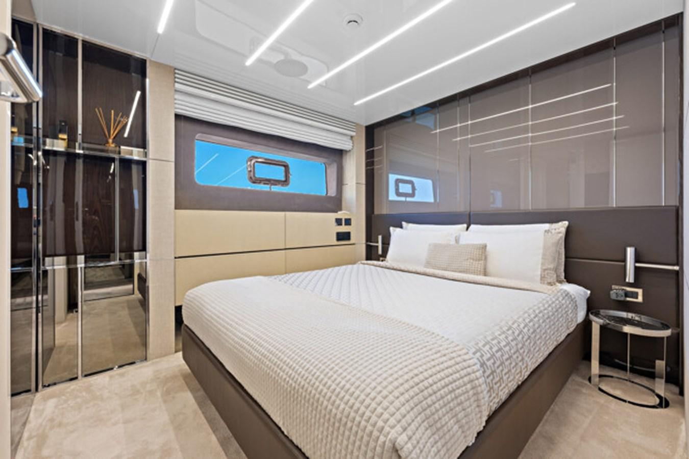 a bed in a room aboard MOSHE Yacht for Sale