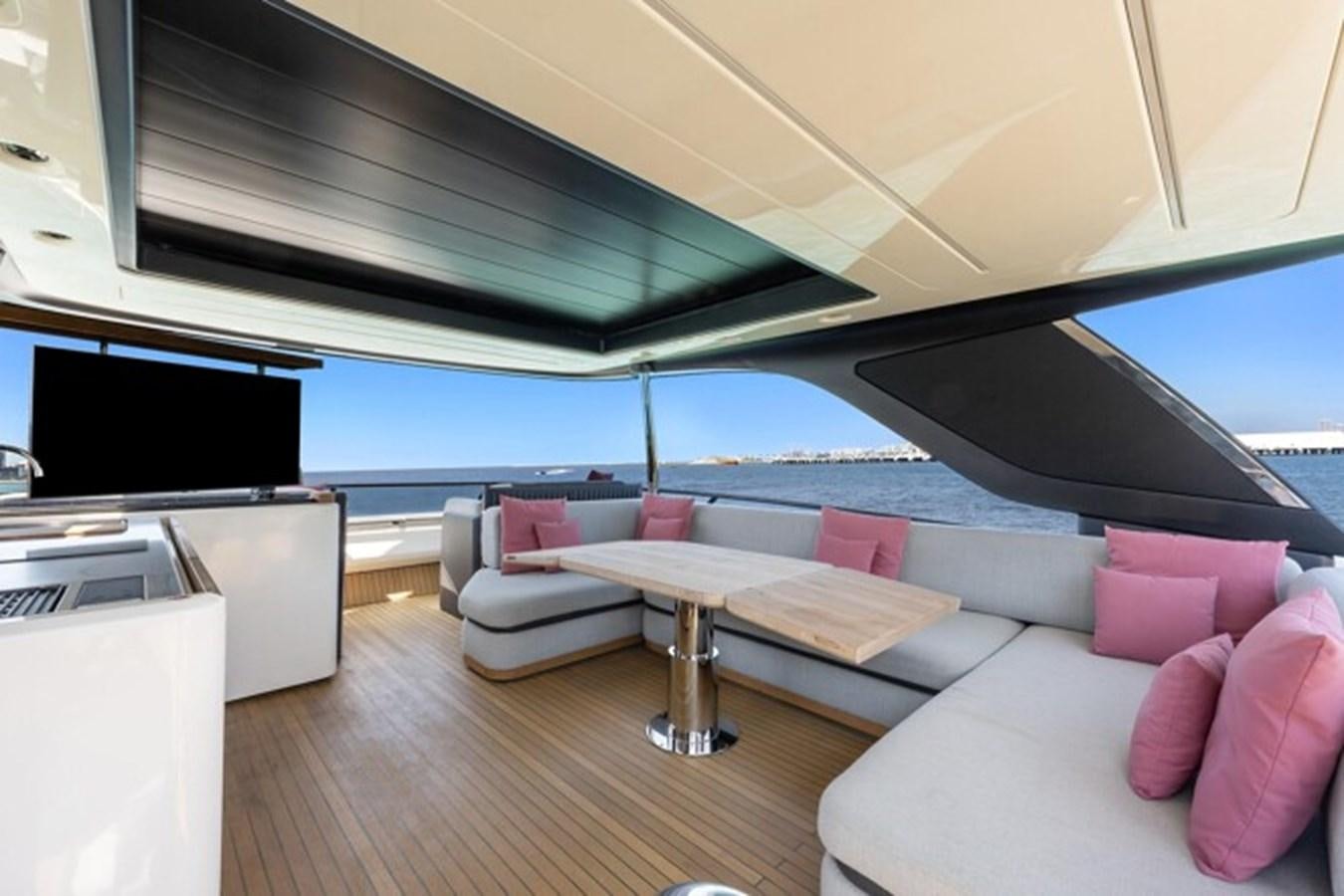 a living room with a large window aboard MOSHE Yacht for Sale