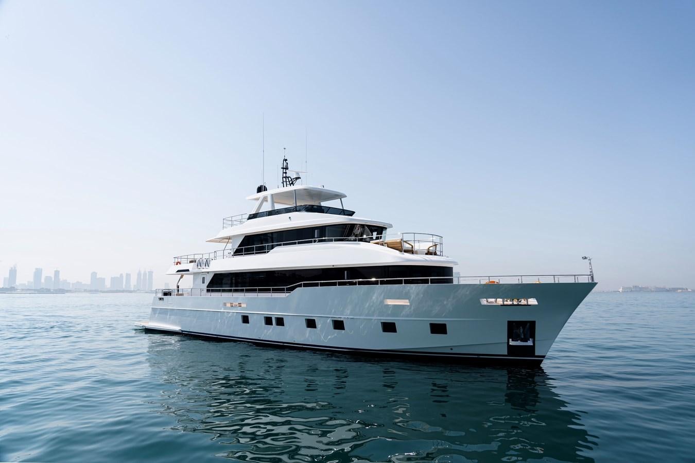 a white yacht in the water aboard #5 NOMAD 101 Yacht for Sale