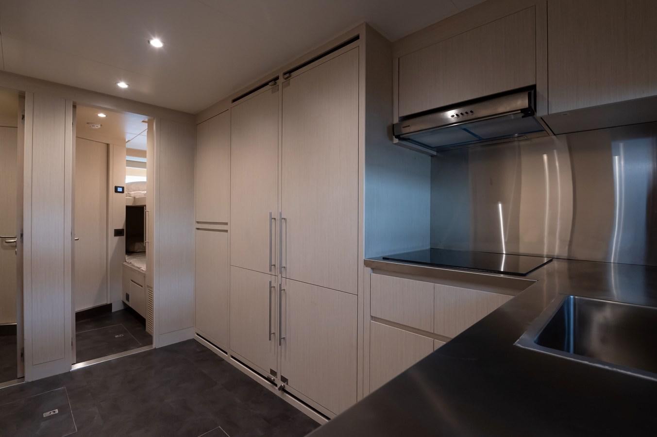 a kitchen with a large sink aboard #5 NOMAD 101 Yacht for Sale