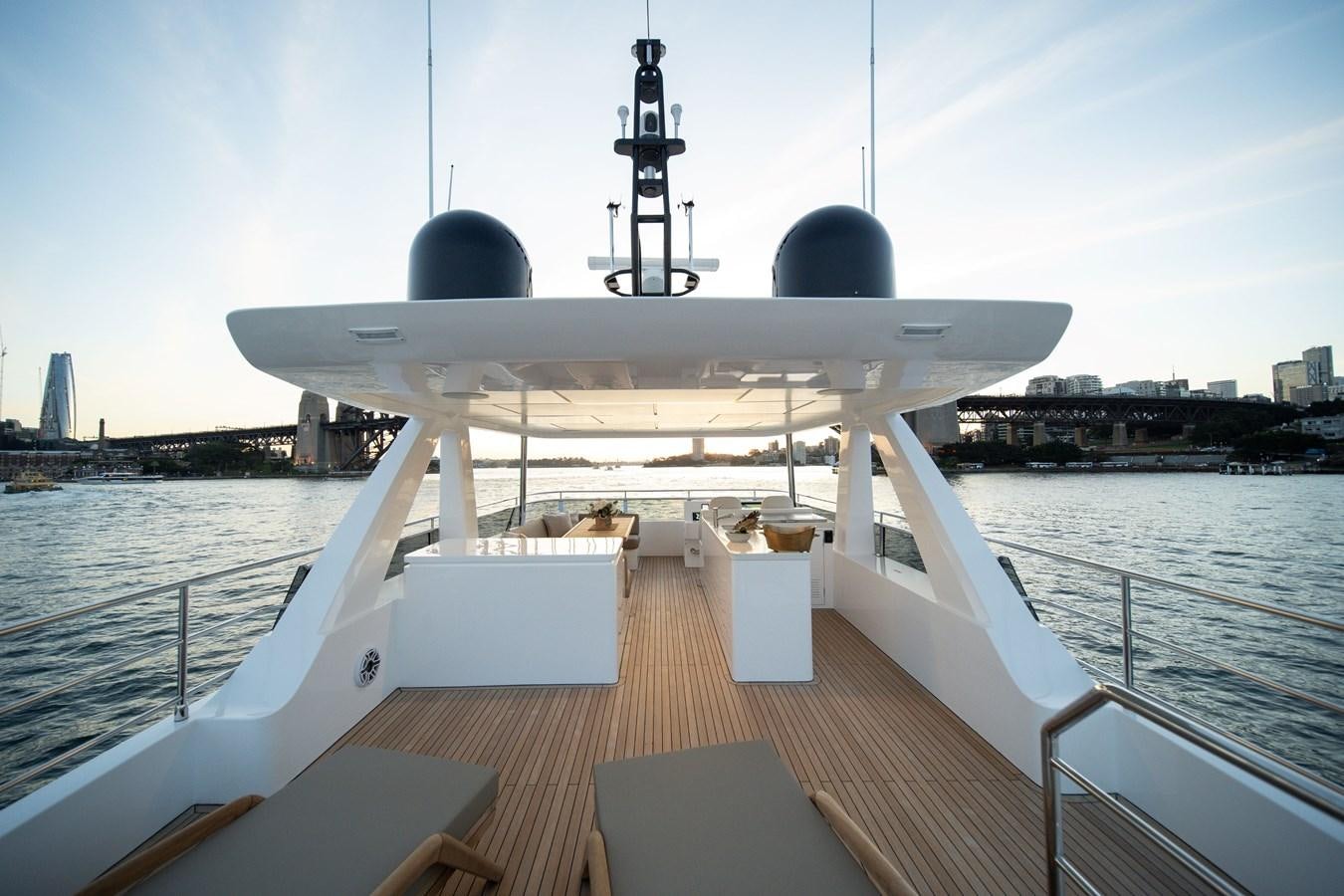 a large white ship with a large satellite dish on the deck aboard #5 NOMAD 101 Yacht for Sale