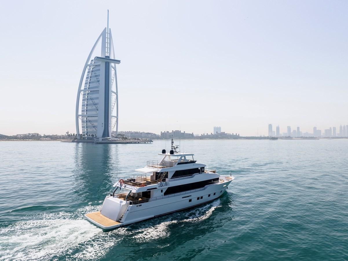 a boat sailing on the water aboard #5 NOMAD 101 Yacht for Sale