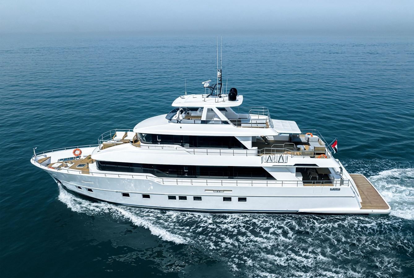 a large white yacht aboard #5 NOMAD 101 Yacht for Sale