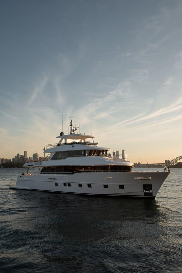 a large white boat in the water aboard #5 NOMAD 101 Yacht for Sale