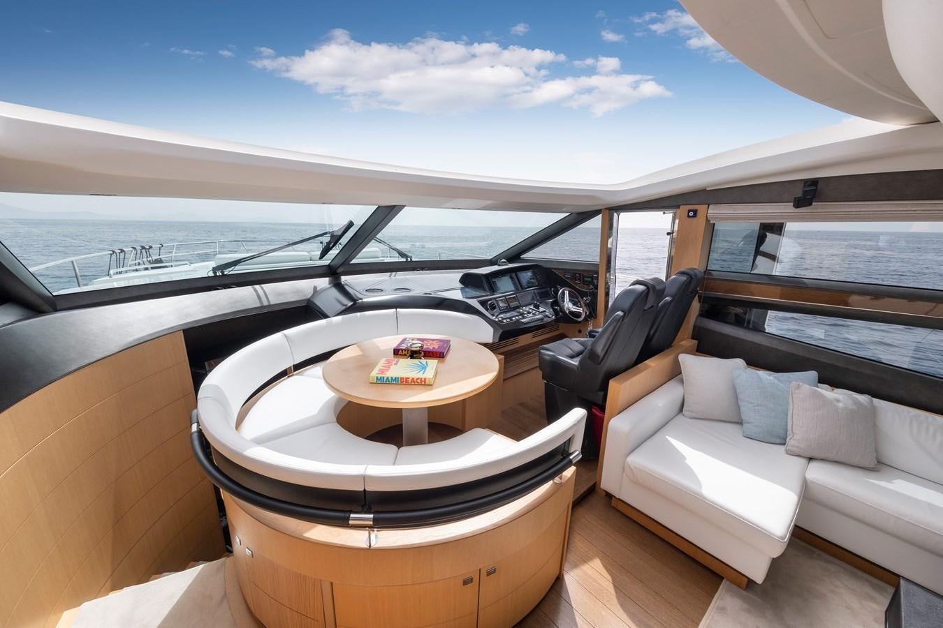 a boat with a table and chairs aboard WANDERER Yacht for Sale