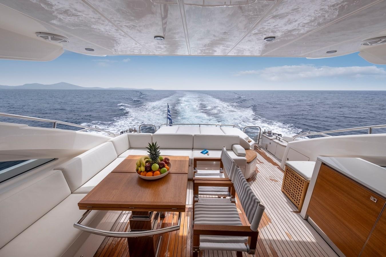 a balcony overlooking a body of water aboard WANDERER Yacht for Sale