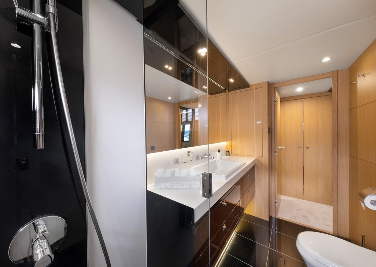 a bathroom with a large mirror aboard WANDERER Yacht for Sale