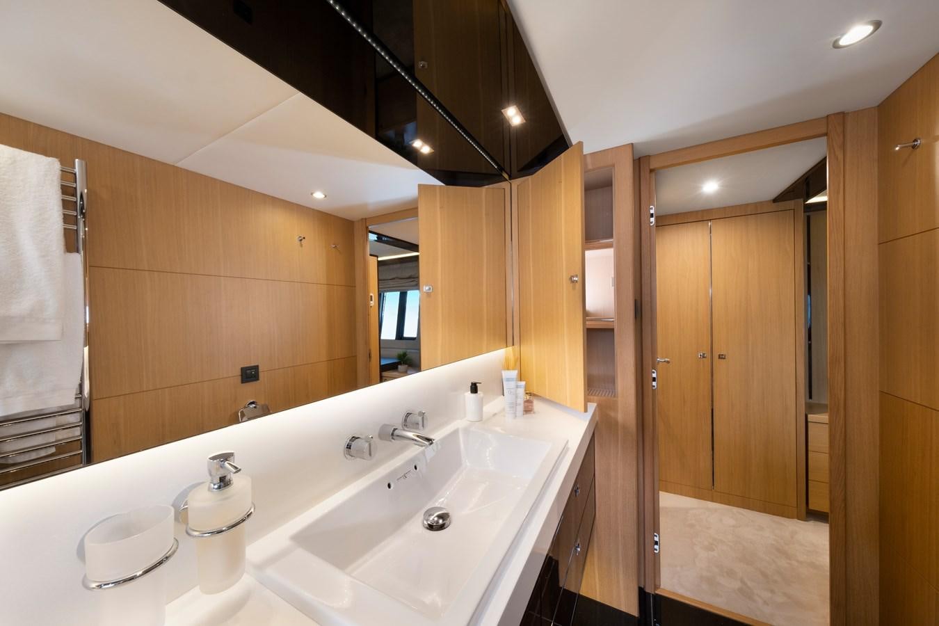 a bathroom with a sink and a mirror aboard WANDERER Yacht for Sale