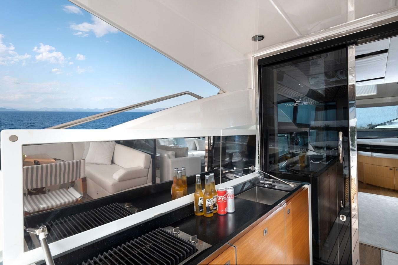 a bar with a view of the ocean aboard WANDERER Yacht for Sale
