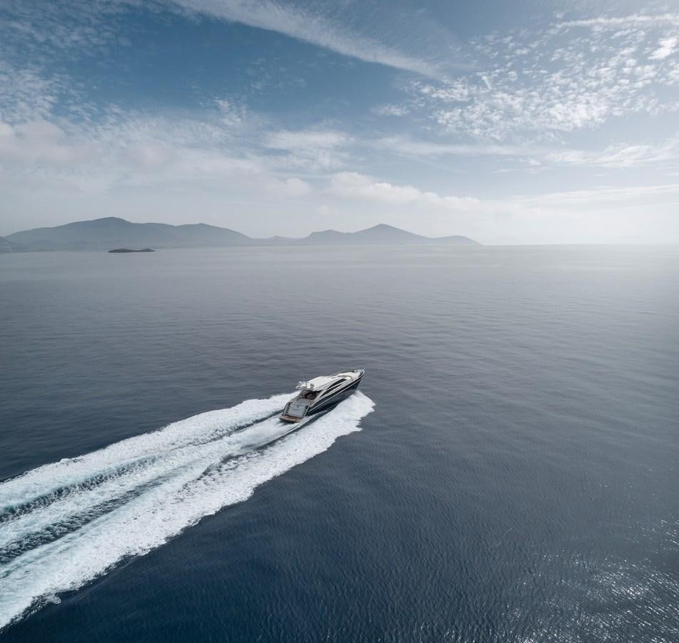a car driving on a road in the snow aboard WANDERER Yacht for Sale