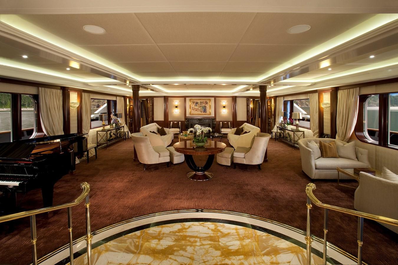 a living room with a large rug aboard ATTESSA IV Yacht for Sale