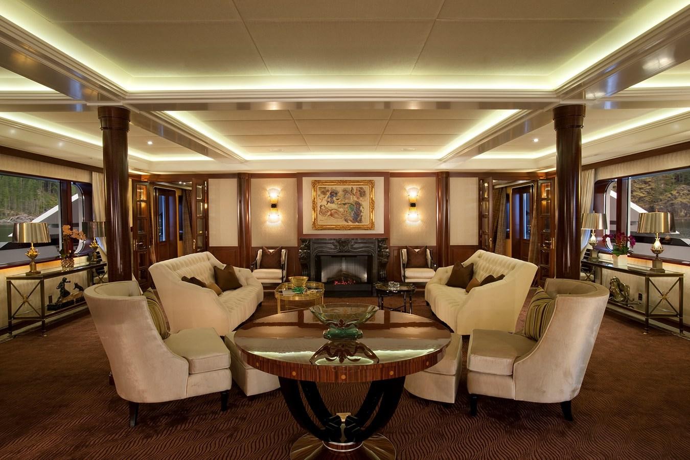 a living room with a fireplace aboard ATTESSA IV Yacht for Sale
