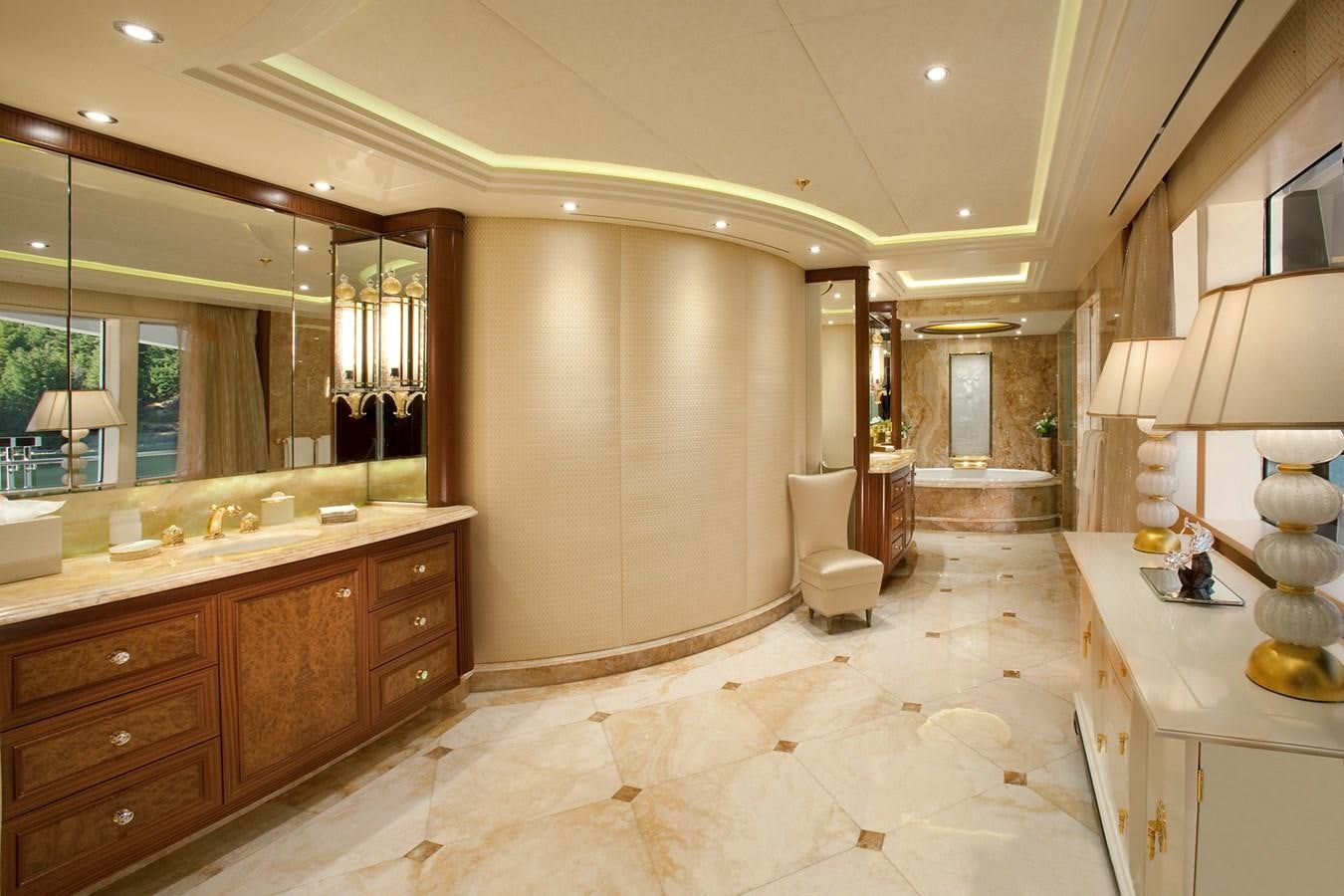 a bathroom with a large mirror aboard ATTESSA IV Yacht for Sale