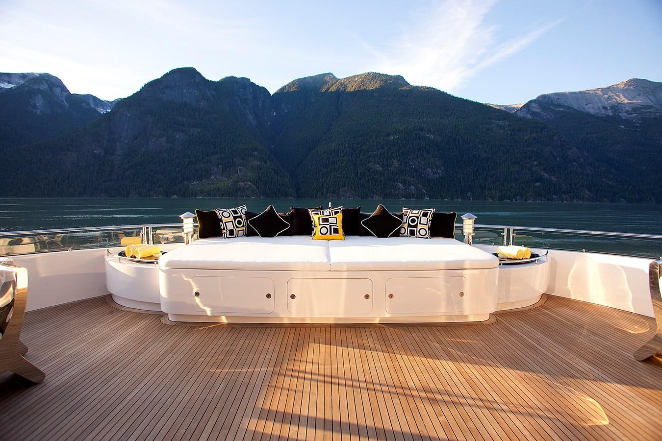 a white boat on a deck aboard ATTESSA IV Yacht for Sale