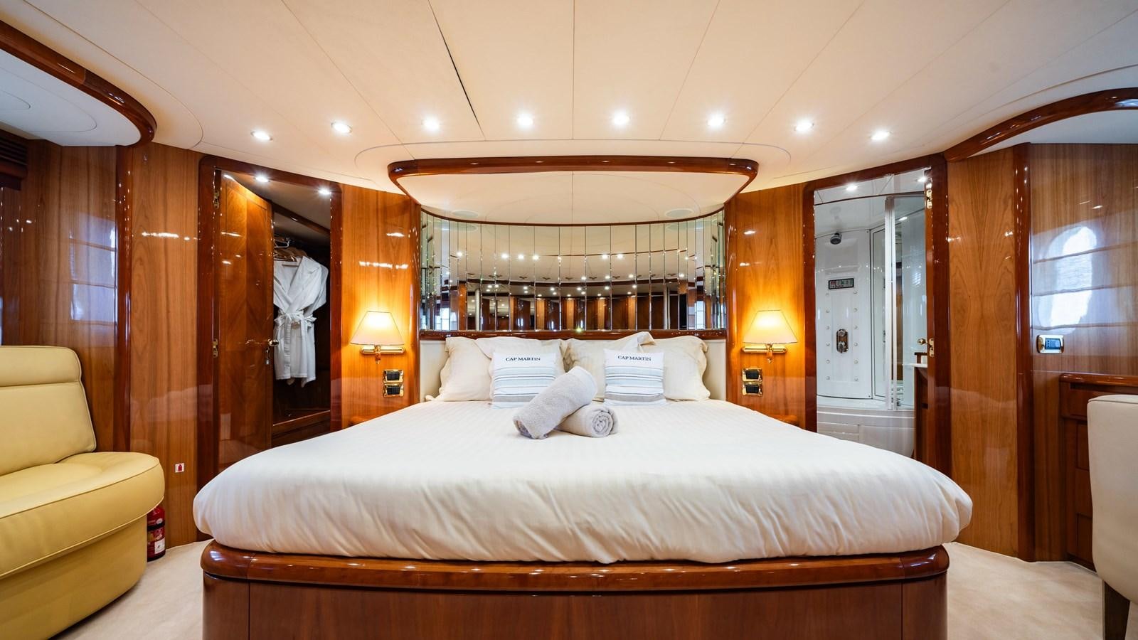 a bed in a room aboard BEIJA FLORE Yacht for Sale
