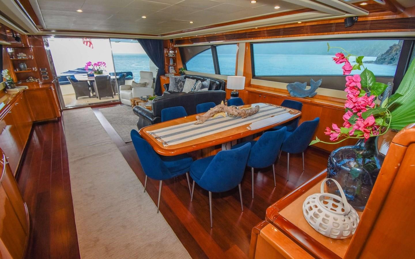 a room with a table and chairs aboard FER88117B606 Yacht for Sale