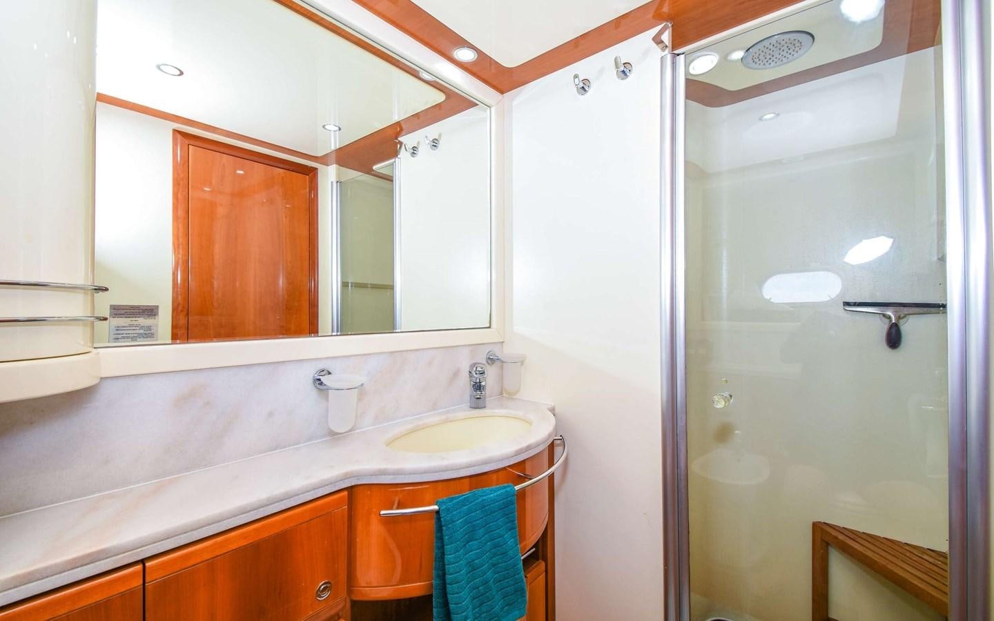 a bathroom with a large mirror aboard FER88117B606 Yacht for Sale