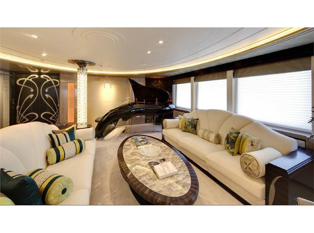 a living room with a couch and a chair aboard AMARYLLIS Yacht for Sale