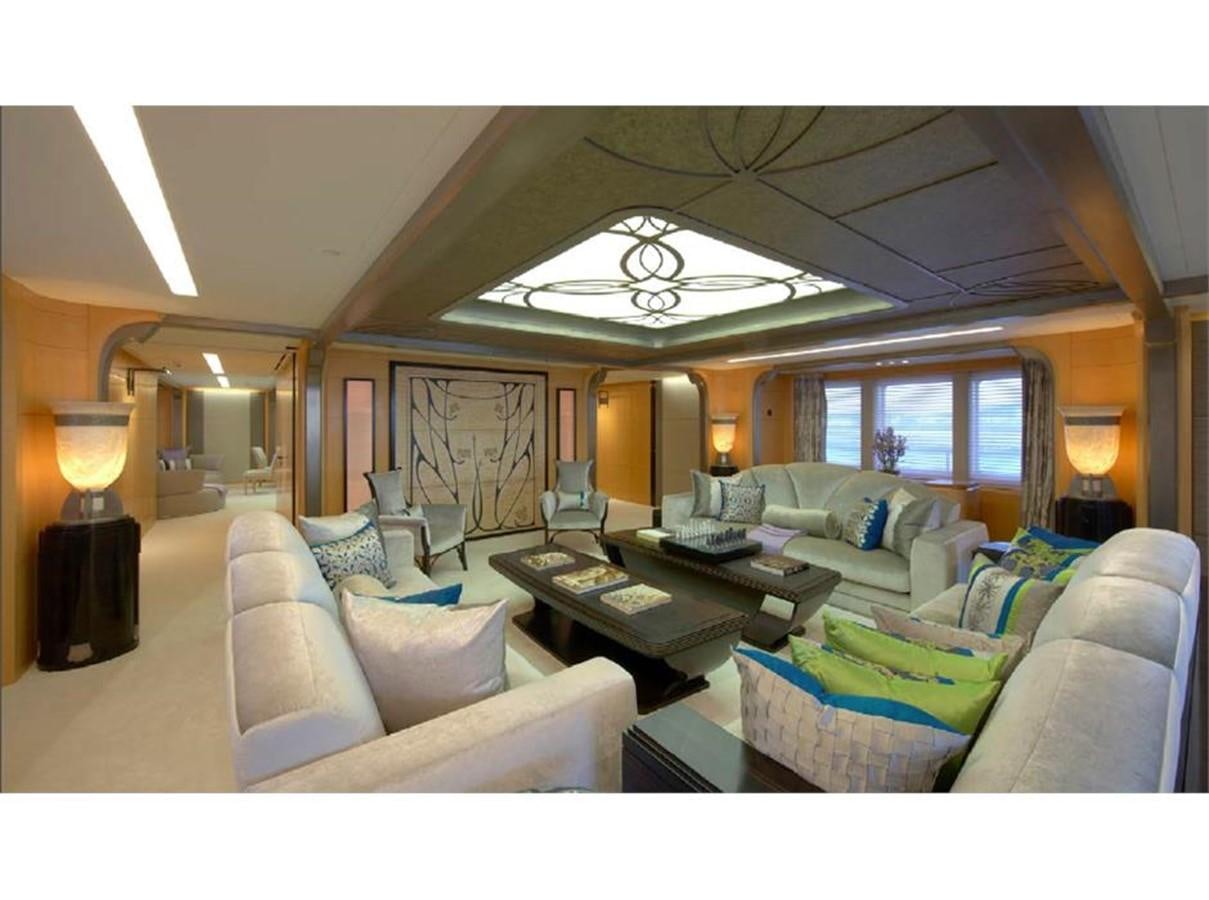 a living room with a large chandelier aboard AMARYLLIS Yacht for Sale