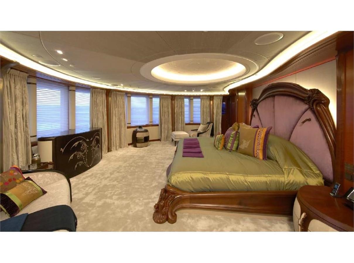 a bedroom with a large bed aboard AMARYLLIS Yacht for Sale