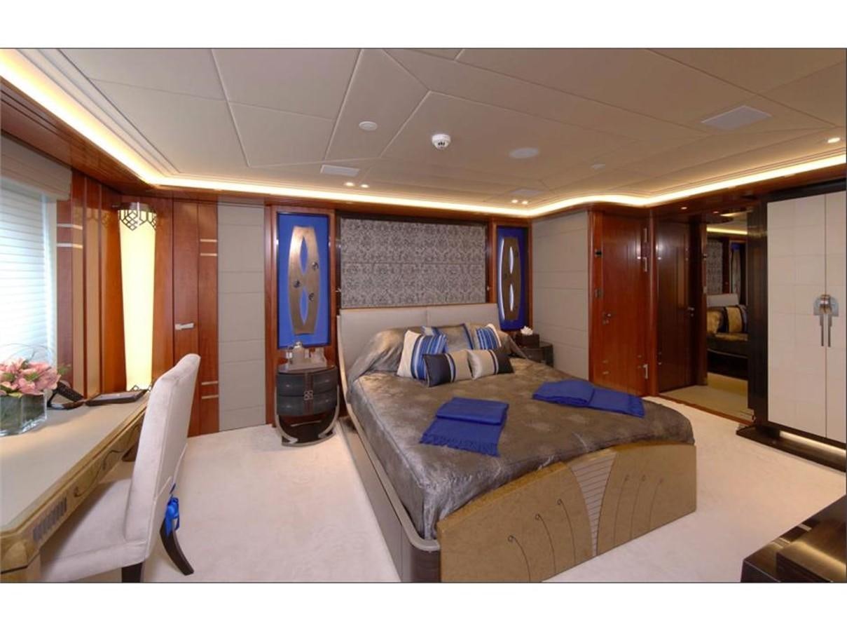 a large bedroom with a bed aboard AMARYLLIS Yacht for Sale