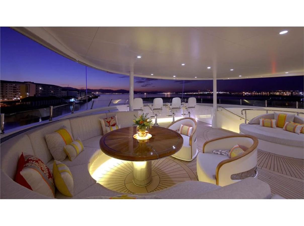 a room with a table and chairs aboard AMARYLLIS Yacht for Sale