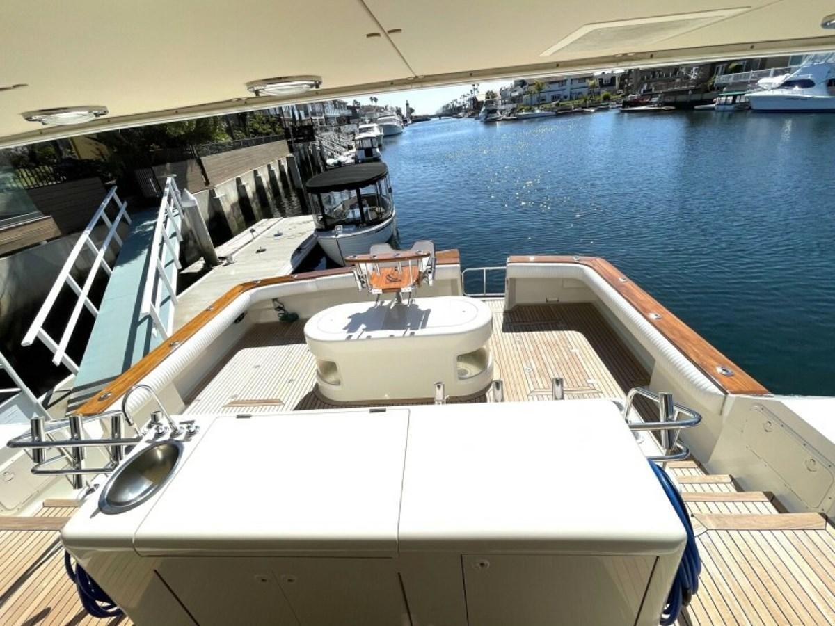a boat on the water aboard AFTER MIDNIGHT Yacht for Sale