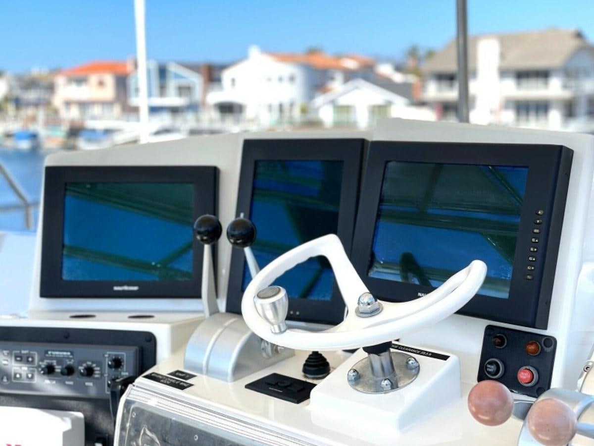 a video game console and a video game console aboard AFTER MIDNIGHT Yacht for Sale