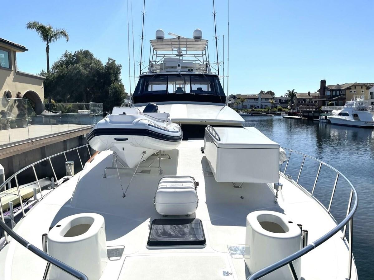 a boat on the water aboard AFTER MIDNIGHT Yacht for Sale